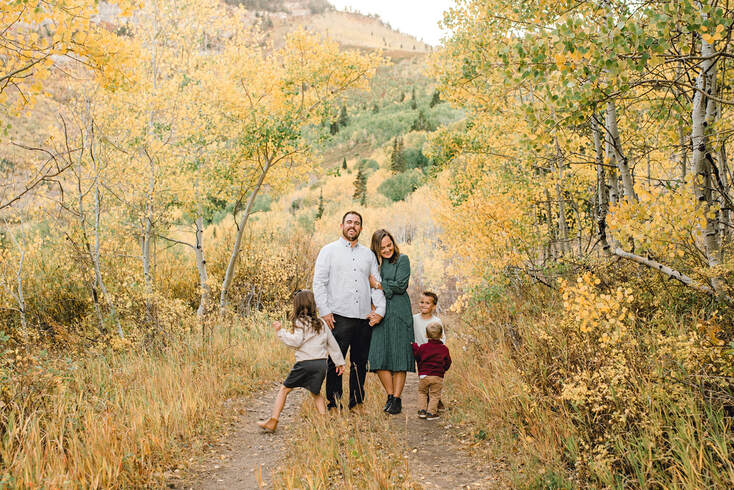 American Fork Canyon fall family photos at sunset with yellow aspens
