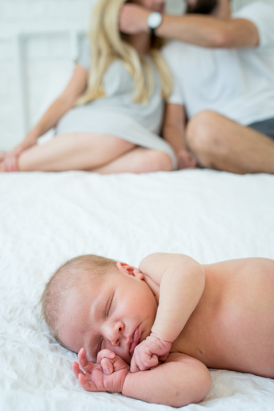 Neutral colored studio lifestyle newborn session in Utah by Flying Gull Photography