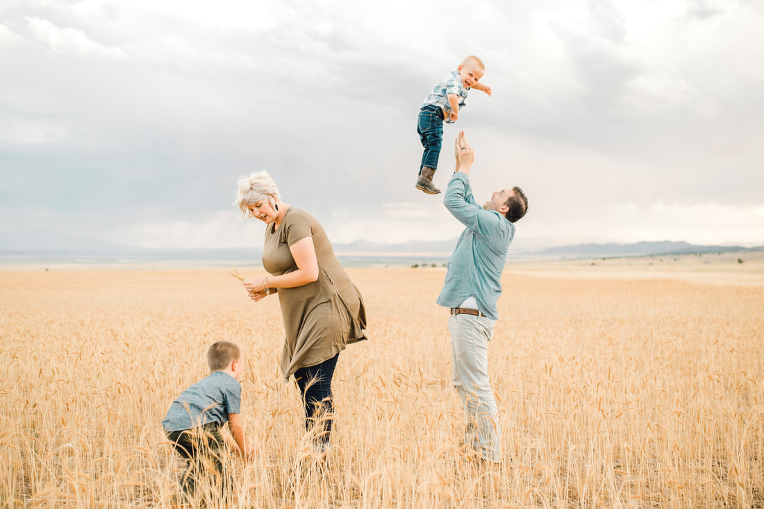 Family in wheat field in Utah