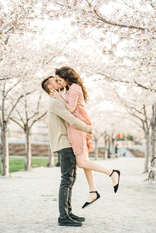 Utah state capitol engagement photos with cherry blossoms