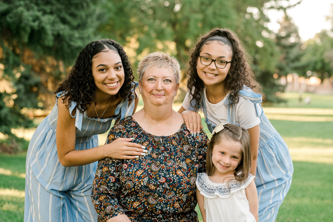 Photo of grandmother with 3 granddaughters, Utah best extended family photographer