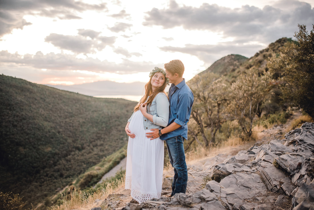 Maternity portrait with husband and wife in Utah mountains
