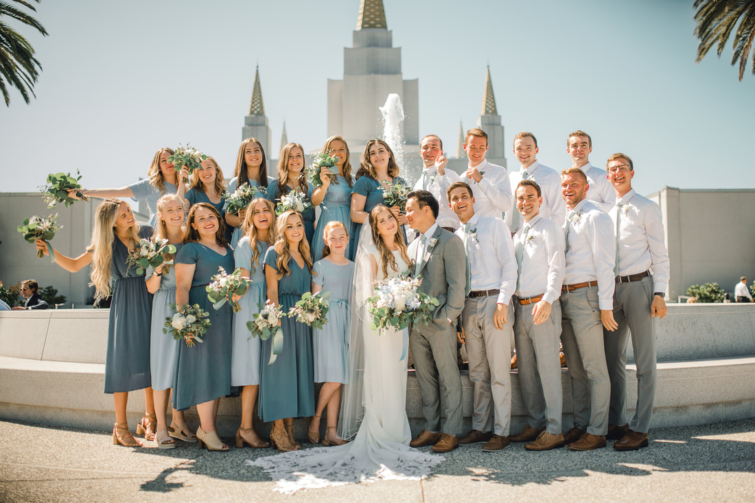Oakland California wedding party with newlywed couple LDS temple