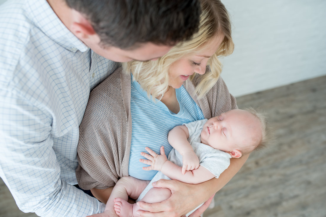 Bright and airy natural light studio lifestyle newborn session by Flying Gull Photography