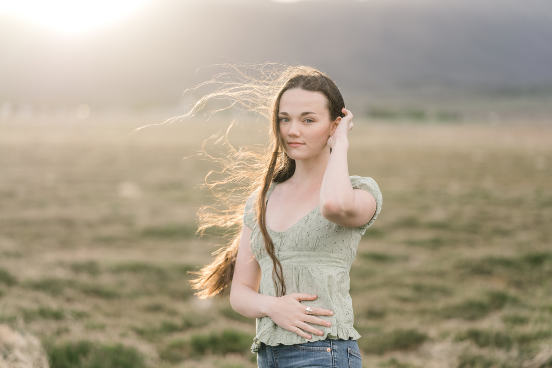 Senior girl portrait in field of wildflowers in Eagle Mountain Utah