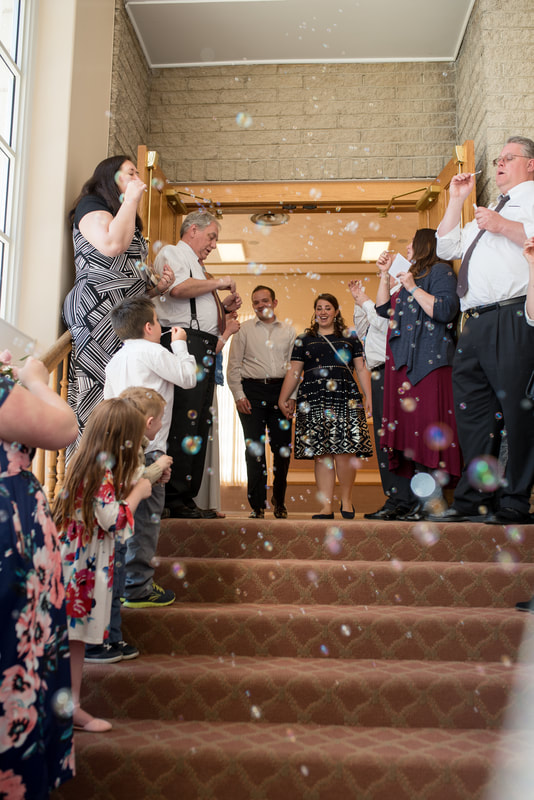 couple exiting reception with bubble send-off Manti, Utah wedding photographer Flying Gull Photography