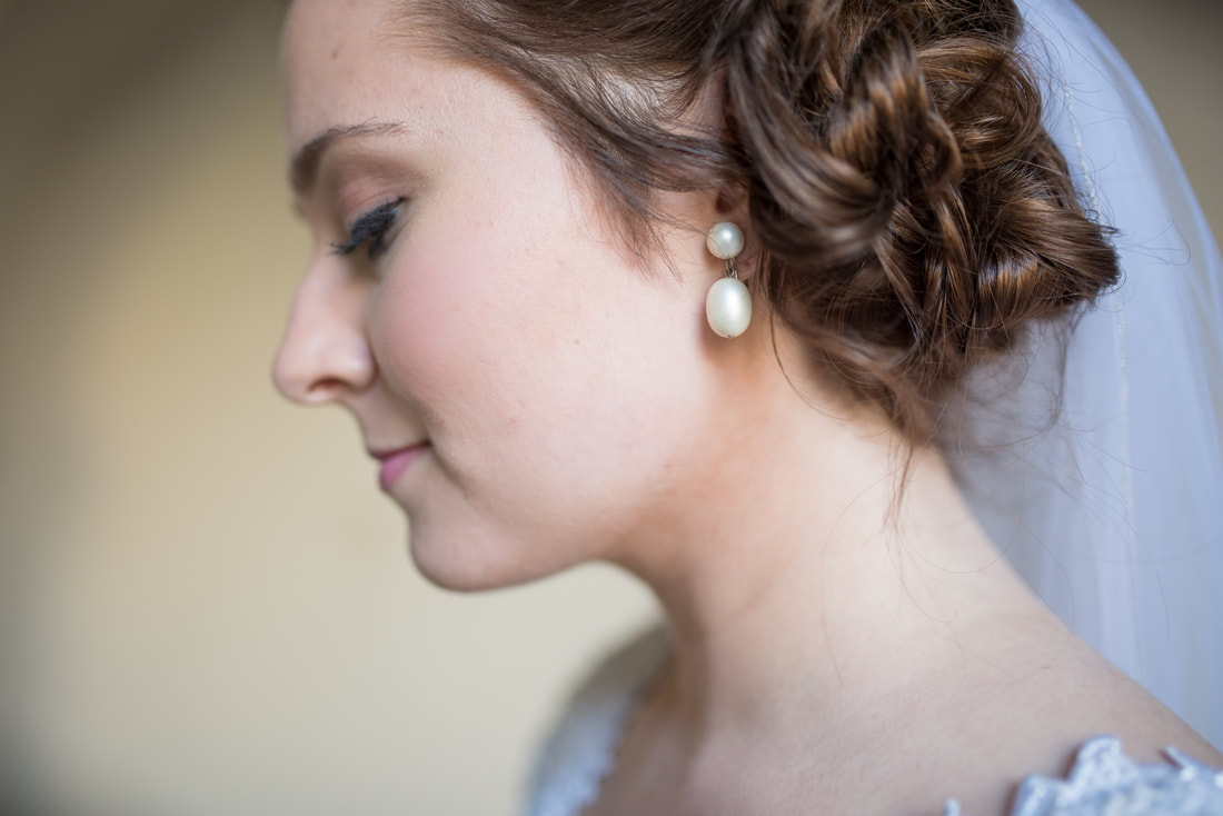 Bride with pearl drop earrings