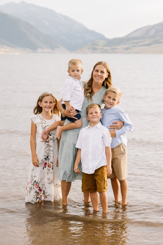 Heather Wrigley, owner and photographer at Flying Gull Photography, a family and wedding photographer based out of Utah County